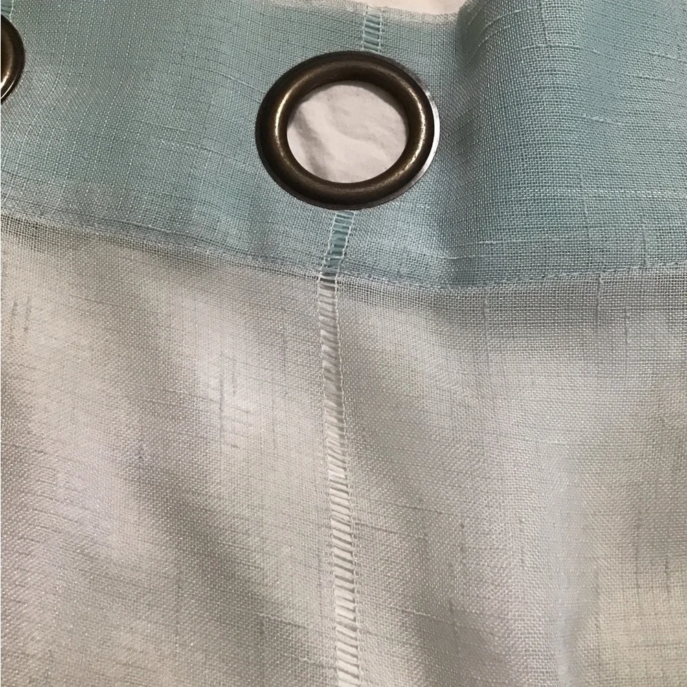 A total of 4 mint green 37 x 96 sheer Curtain panels with Bronze Grommets